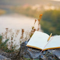 A meditation journal open on a calm, softly lit surface